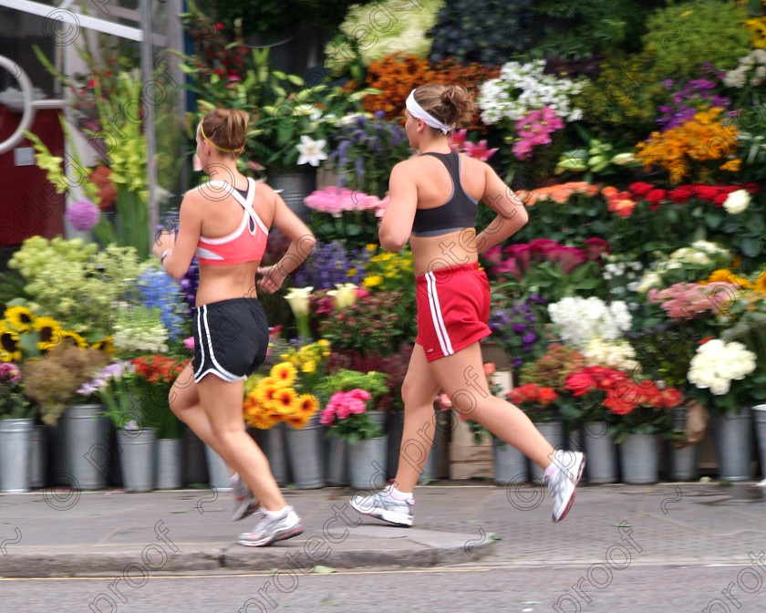 London 057 
 London - Sunday morning joggers in South Kensington 
 Keywords: London, South Kensington, joggers, jogging, runners, exercise, street life. exercise, fitness, lifestyle, running, city, cities, sport, recreation, UK, England, Britain