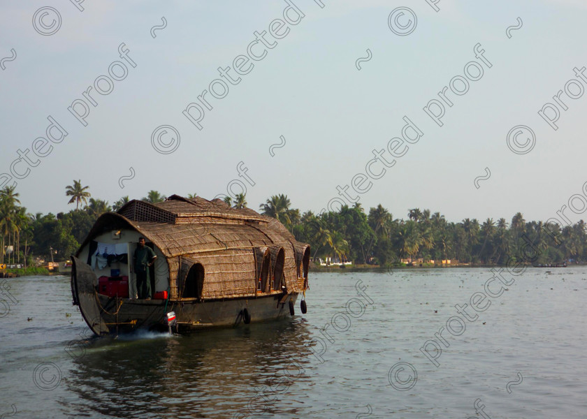 Kerala Backwaters Houseboat 015 
 The peaceful backwaters of Kerala, India 
 Keywords: Kerala, Allepey, Alappuzha, houseboat, rice barge, backwaters, canals, kettuvalam, India, Southern India