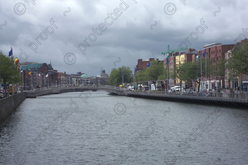Dublin D5781805 
 Dublin - River Liffey 
 Keywords: Dublin, Eire, Ireland, River Liffey, river, water, cityscape, travel, tourism, Ha'penny Bridge, city, cities, capital,