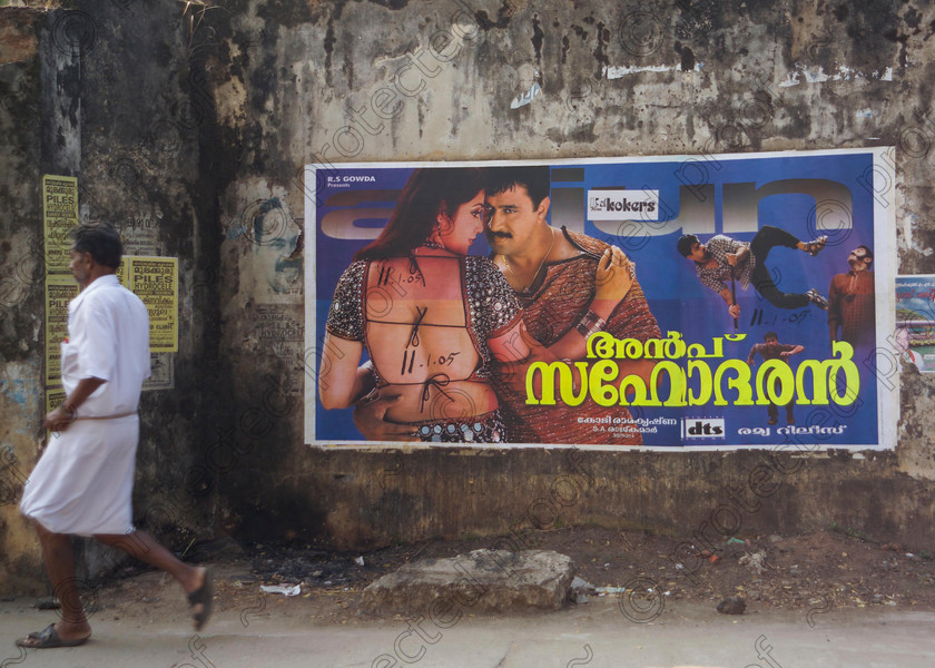 Cochin Bollywood Poster 059 
 Bollywood poster on wall in Cochin, Kerala, Southern India 
 Keywords: Bollywood, poster, art, films, Cochin, Kerala, India, advertising, Cochi, Southern India, advertising