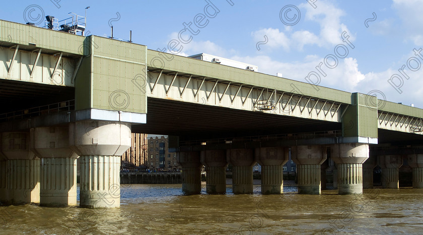 Riveer Thames 59 
 Cannon Street Railway Bridge - central London 
 Keywords: Cannon Street Railway Bridge, Cannon Street, London, bridges, architecture, River Thames, river, travel, tourism, railway, trains, water, transport, travel, UK, England, Britain