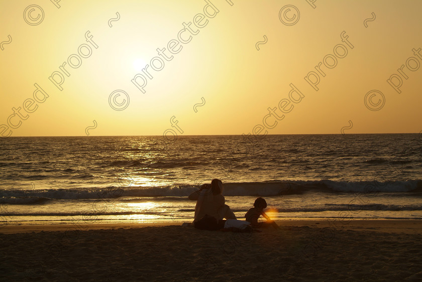 Goa A 053 
 Sunset at Varca Beach, Goa 
 Keywords: sunset, sun, sea, sky, silhouette, people, beach, Arabian Sea, Salcette, Varca, India, Southern India, travel, tourism,